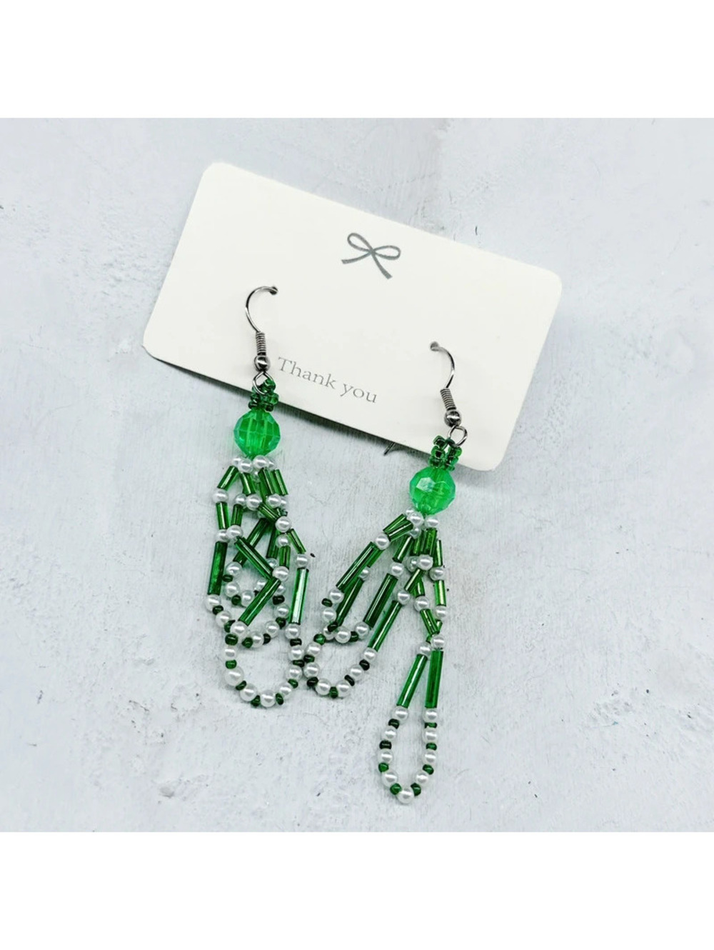 159u. Green Plastic Earrings Beaded
